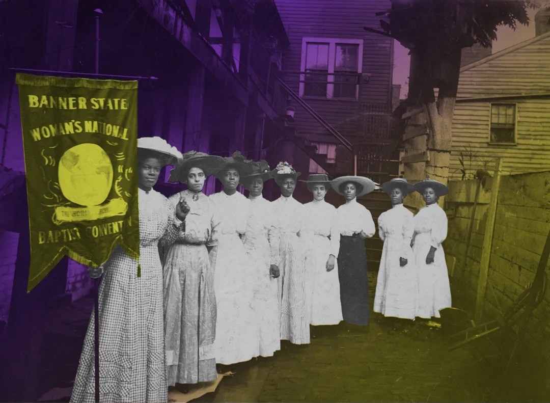 Black women suffragists publicly organizing and standing proudly together.