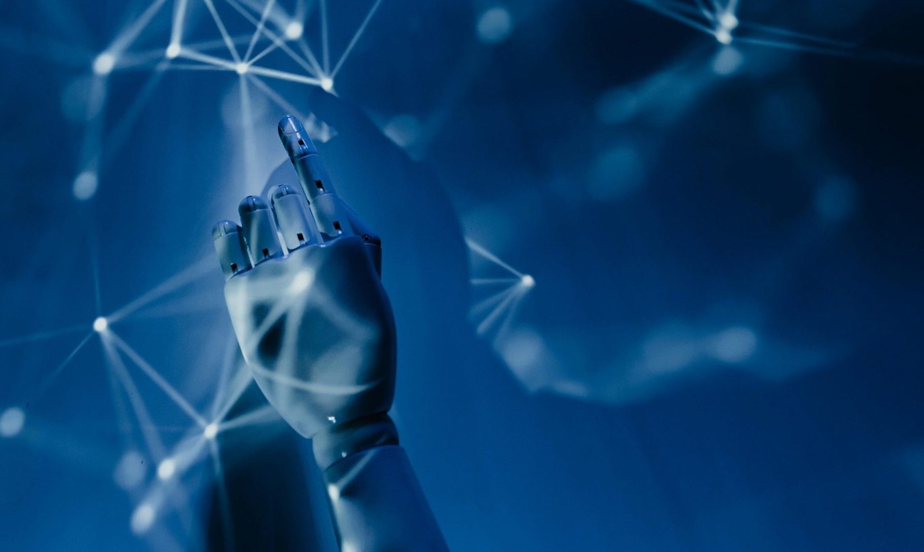 A robotic hand tracing digital connections in the internet space. As some of such technologies are being used to build a "big data" platform for healthcare, the image invoking the connection between robots and data is relevant.